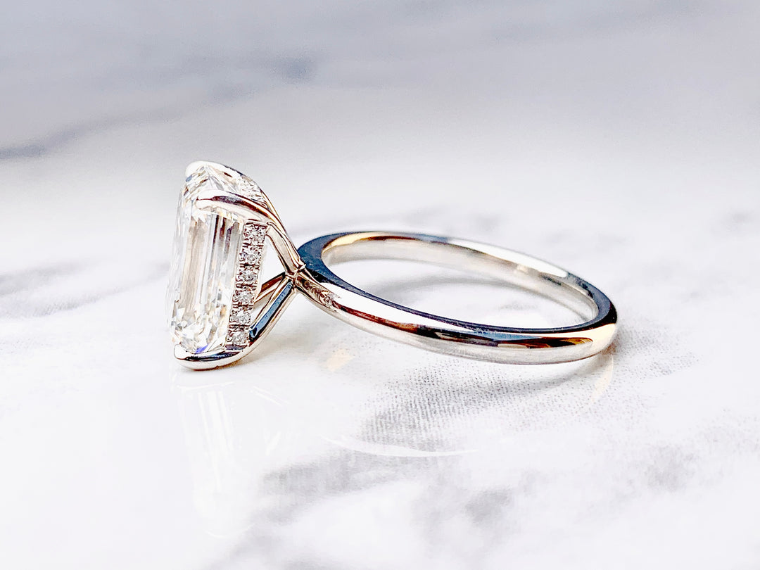 Emerald Cut Solitaire with Hidden Diamond Halo